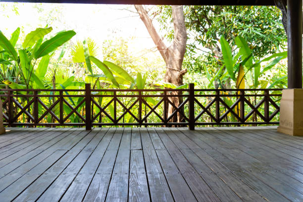 istock Empty wooden deck in the garden 1335040356