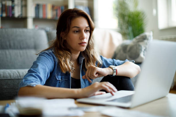 istock Young woman working at home 1335043860