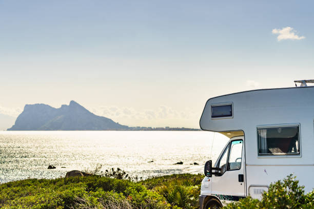 istock Caravan on spanish coast, Gibraltar rock on horizon 1335044883