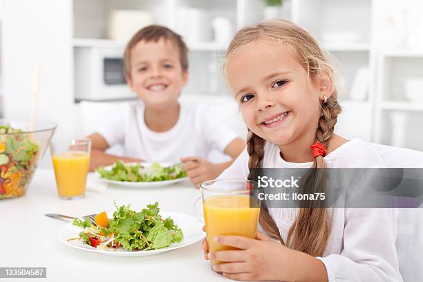 Kids Eating A Healthy Meal Stock Photo - Download Image Now - Beautiful People, Beauty, Breakfast