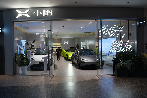 Shanghai.China-August 2021: Xpeng electric car store with customer. Xpeng Motors is a Chinese electric car brand.