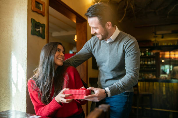 istock Couple celebrating Valentine's Day at a restaurant 1335052520