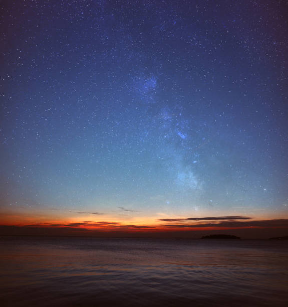 istock Starry sky above the sea horizon 1335057894