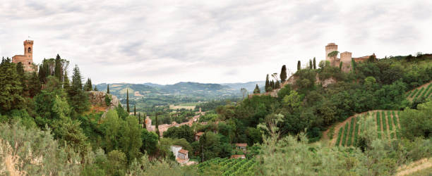 Brisighella, Ravenna, Emilia-Romagna, Italy. Beautiful panoramic view from on the medieval city and the fortress of Manfrediana ,famous symbol of the defensive city, the clock tower