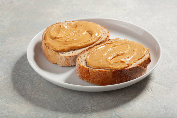 istock smooth peanut butter bread toast, healthy traditional sandwich 1335061038