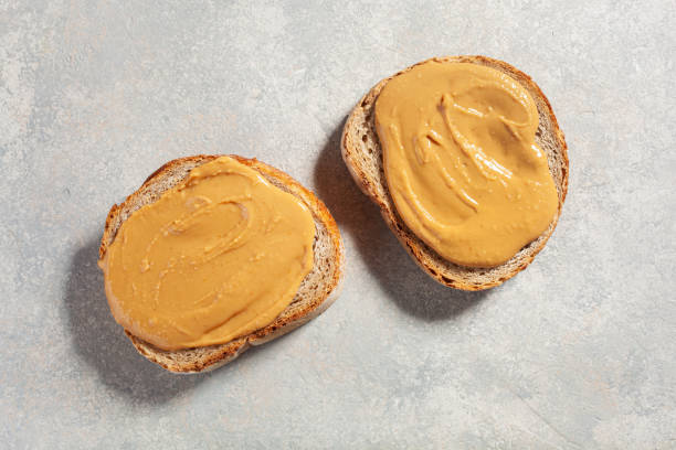 istock smooth peanut butter bread toast, healthy traditional sandwich 1335061045