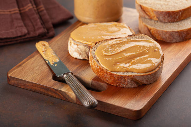 istock smooth peanut butter bread toast, healthy traditional sandwich 1335061072
