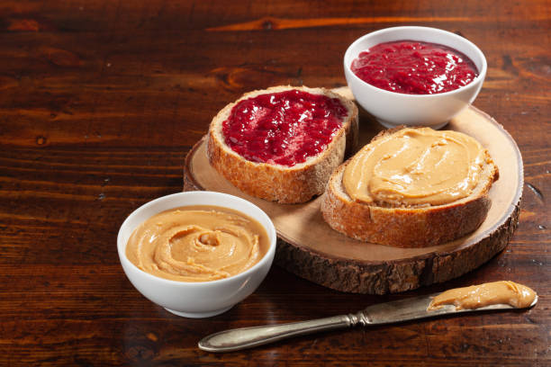 istock smooth peanut butter and jam bread toast, american traditional sandwich 1335061249