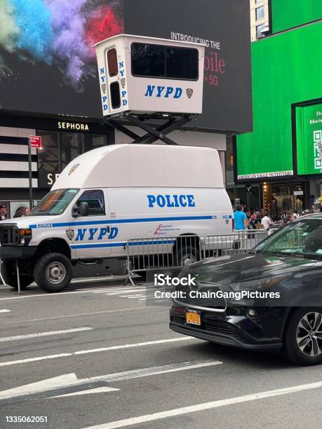Nypd Surveillance Tower Van In Times Square Stock Photo - Download Image Now - City, Color Image, Crowd of People