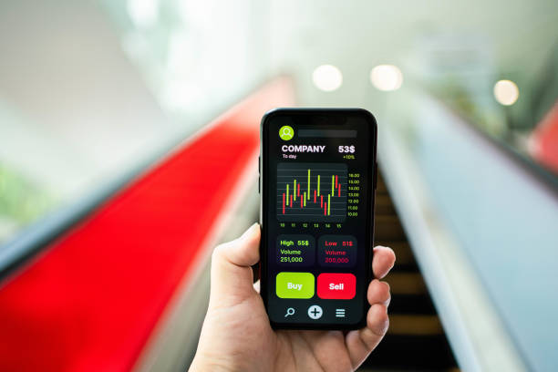 istock Analyzing financial charts on smart phone. 1335065774