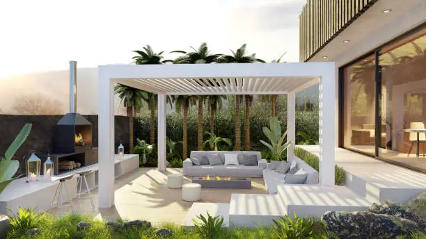 3D render pf luxury villa with wooden outdoor patio and white motorized bio climatic pergola. Barbecue area and sofa set surrounded by tropical garden.