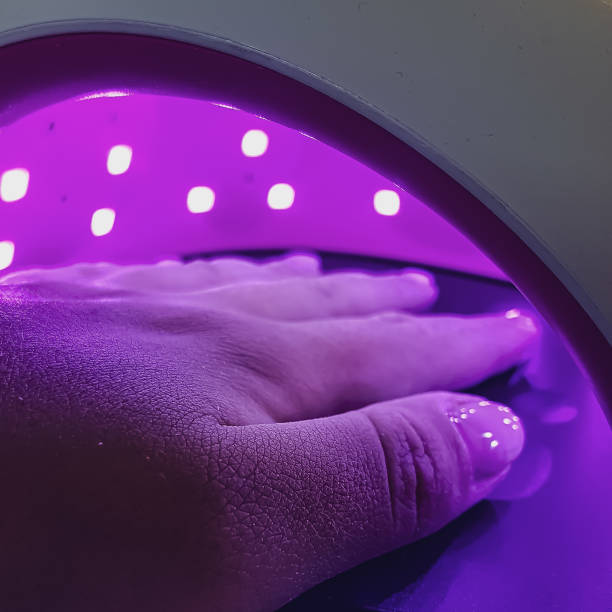 istock Nail design, UV lamp with purple light 1335066709