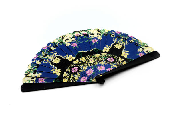istock Blue fan with floral motifs on white background 1335066860