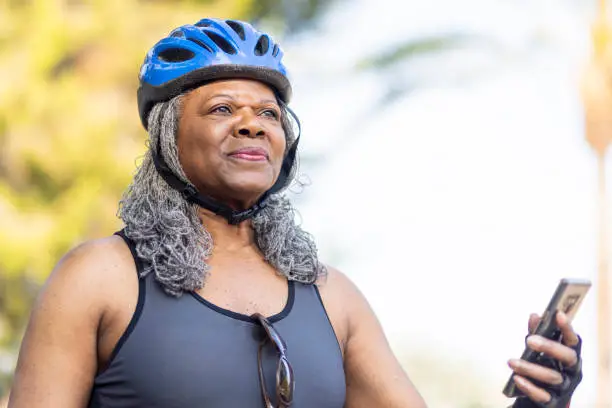 Photo of Senior Black Woman Riding Bicycle Portrait