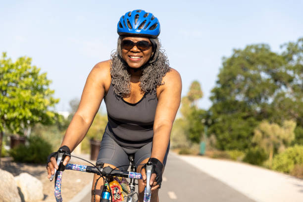 istock Senior Black Woman Riding Bicycle 1335068731