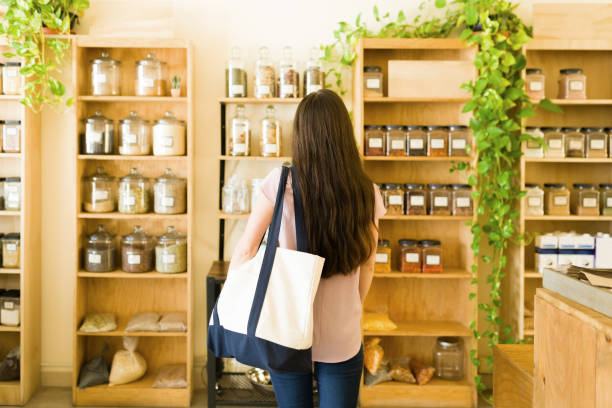 istock Rear view of a customer choosing products 1335069095