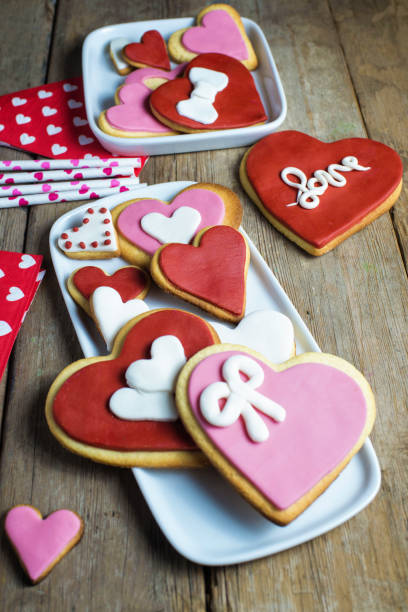 istock Heart shaped cookies on wooden table 1335069271