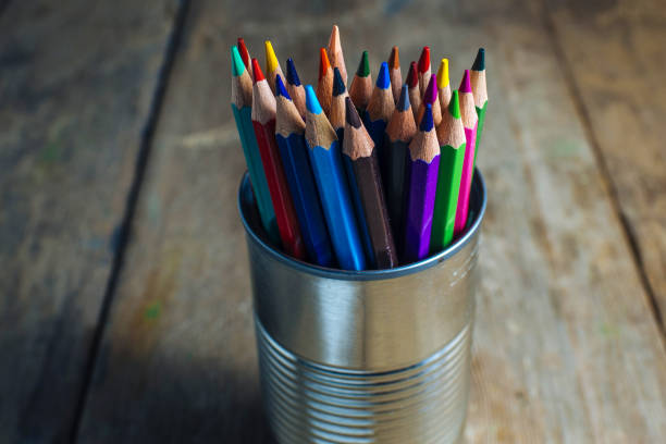 istock Colored pencils on wooden table 1335070222