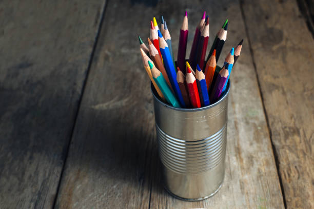istock Colored pencils on wooden table 1335070302