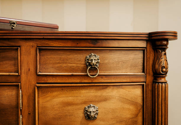 Vintage cabinet with drawers Vintage cabinet with drawers and doors with simple wooden carvings chest furniture stock pictures, royalty-free photos & images