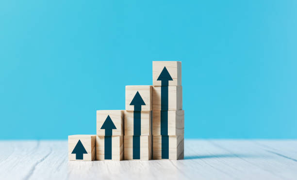 istock wooden block cube stacking as step stair. Business concept growth success process 1335074012
