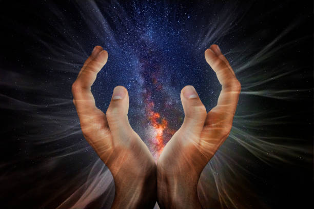 Hands in front of the Milky Way Hands in front of the Milky Way abundance stock pictures, royalty-free photos & images