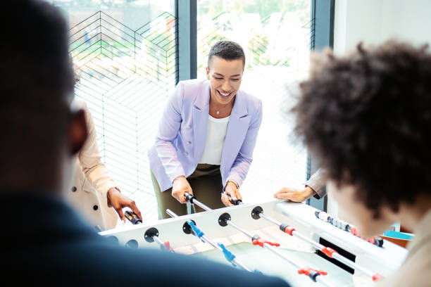 istock Office People Enjoying Table Soccer 1335075757