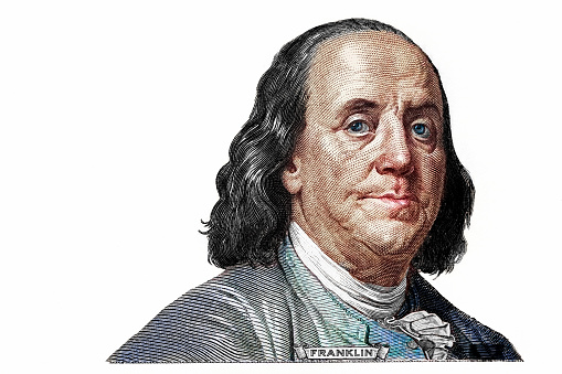 Benjamin Franklin cut on new 100 dollars banknote isolated on white background