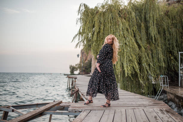 istock Tourist enjoying the view from the dock 1335079772