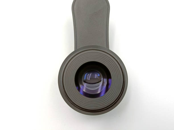 istock External macro lens, mobile phone clip. On white background. Accessory for mobile photography 1335079789