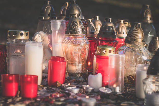 istock burning candles background, funeral concept 1335082134