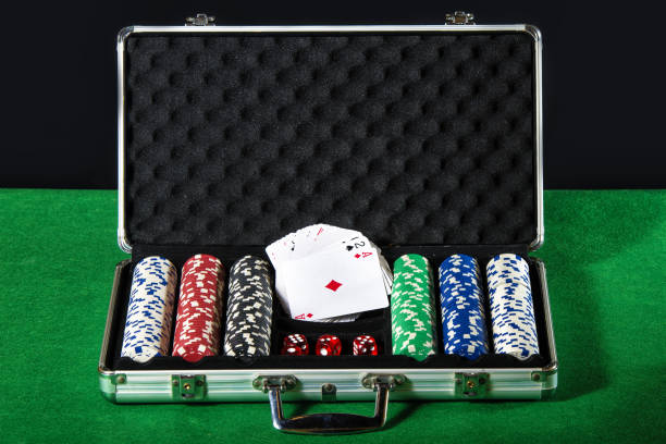 Briefcase poker with cards and dice betting stock photo