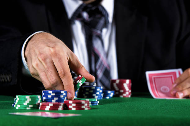istock Man betting on the casino 1335083652