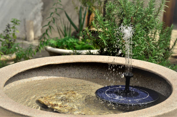 istock Fountain of solar energy decorating yard 1335084669