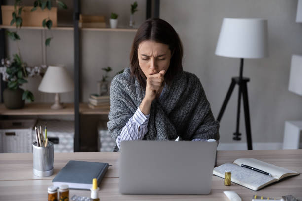 istock Unhealthy woman feel sick work on computer at workplace 1335085250