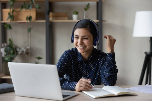 istock Smiling Indian woman study online on laptop 1335085320