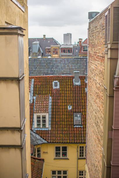 istock View over old rooftops in a city.. 1335086454