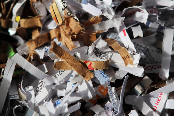 istock Macro view of brown and white shredded paper 1335086908