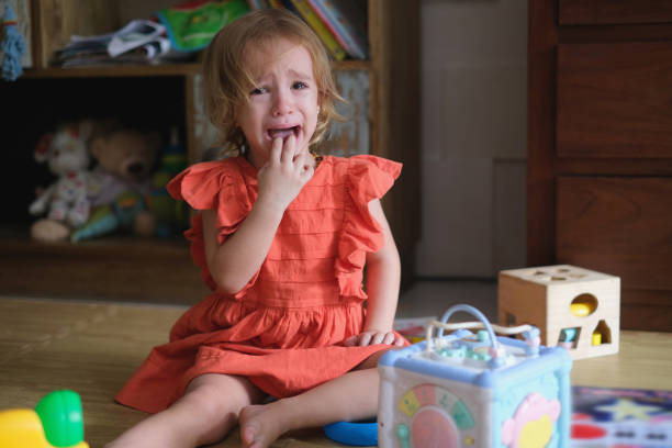 Sad Little Girl Crying During Her Tantrum stock photo