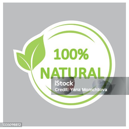 istock Circle with green leaf, a symbol for 100% natural products. 1335098812