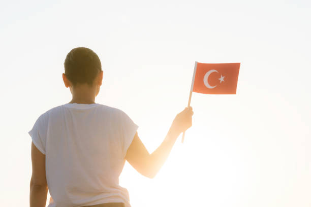 istock Woman with Flag 1335098928