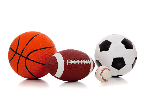 Assorted sports balls on white stock photo