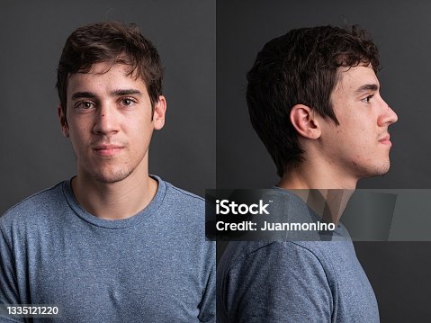 istock Serious young man front and profile mugshots 1335121220