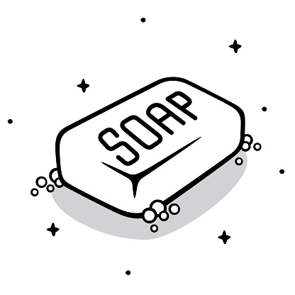 Vector illustration of a hand drawn black and white bar of soap against a white background.