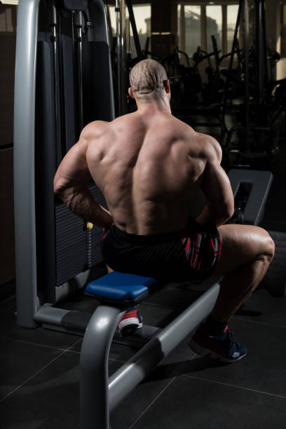 istock Attractive Young Man Resting In Gym Afther Exercise 1335130568