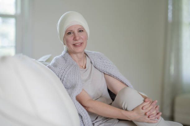 istock Breast cancer survivor smiling while resting at home 1335131369
