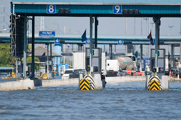 Flooded toll gate on a motorway in Bangkok stock photo