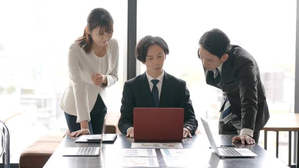 istock asian business group working in the office 1335142490