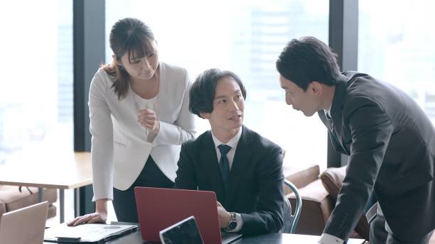 istock asian business group working in the office 1335142500