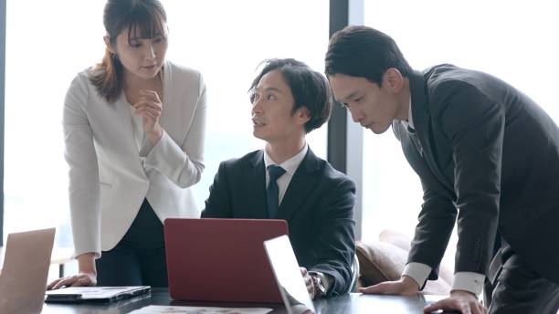 istock asian business group working in the office 1335142502